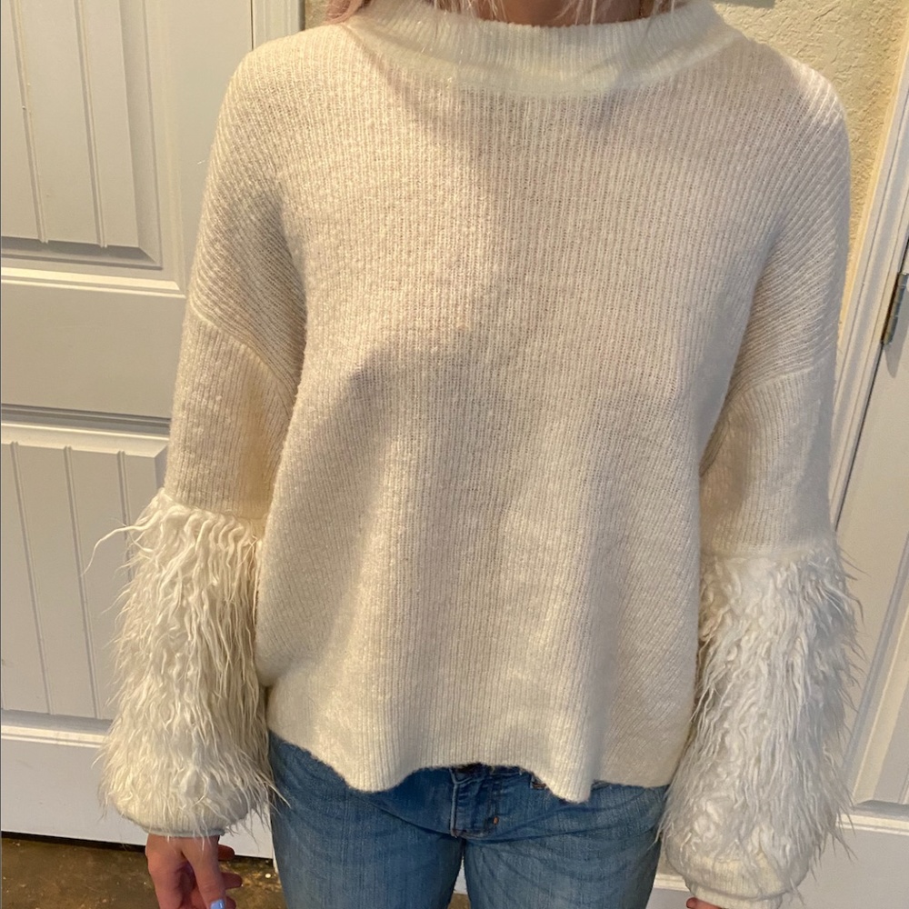 white sweater